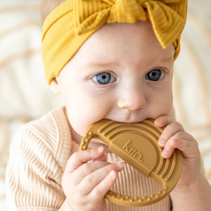 kiin-baby-rainbow-silicone-teether-tan-retreat-yourself